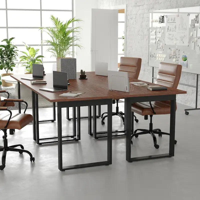 Tavolo da riunione con piano in laminato e base a U